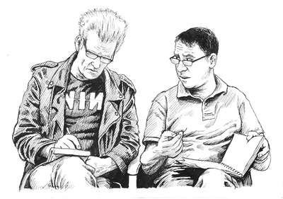 poached-creative-2-leather-jacket-glasses-two-men-talking-writing-book-meeting-jpg